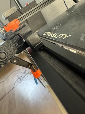 Camera extrusion clip
