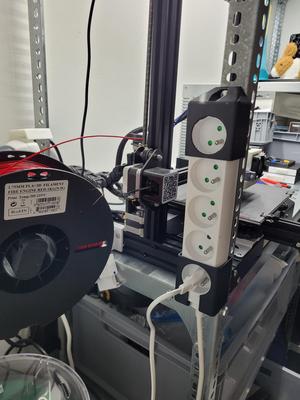 Electric outlet extender mount