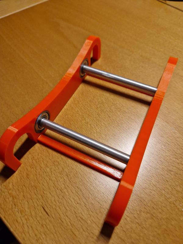 Filament roller low profile for RepBox with filament slide bars