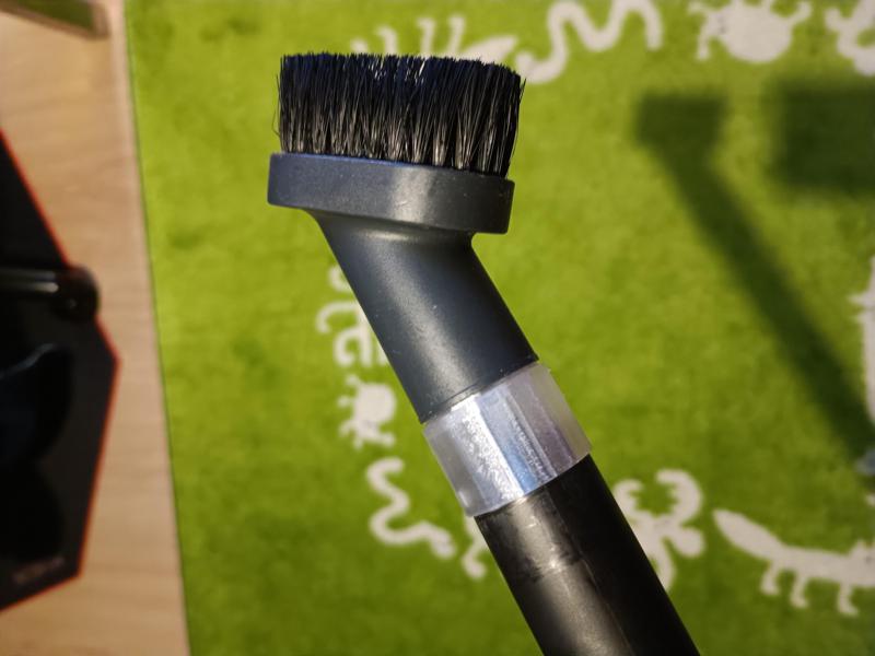 Adapter for vacuum cleaner brush nozzle