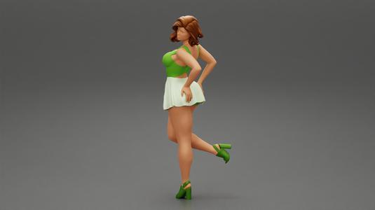 Attractive Young Woman In A Short Skirt With Her Hands On Hips