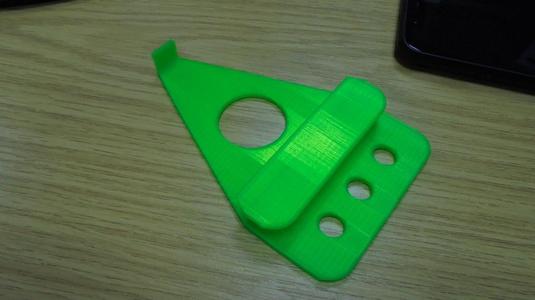 Mobile phone holder to sit on laptop screen