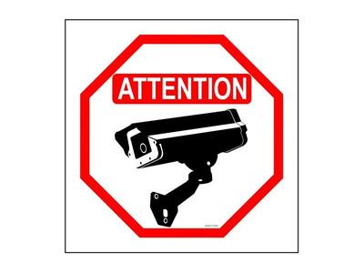 Filming in progress sign