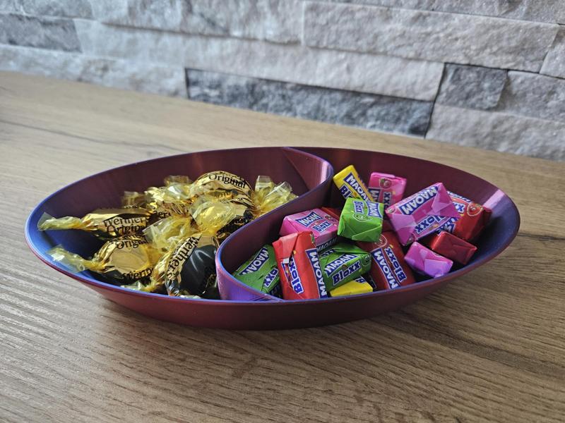 Oval bowl with partition for pistachios or treats