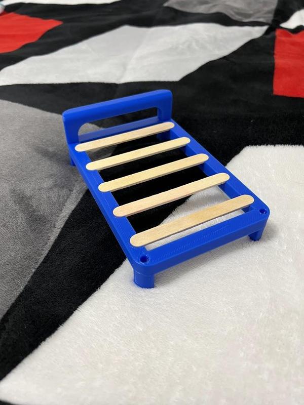 Miniature bed for reusing popsicle sticks