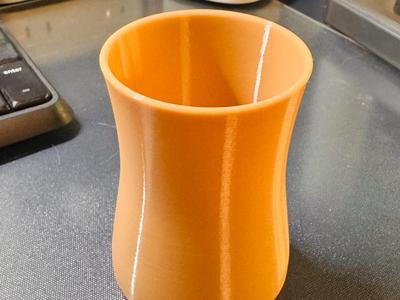 Simply designed small jar (designed to hold stirring sticks)