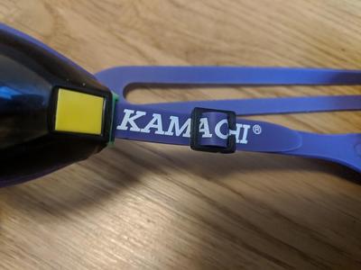 Swim goggles strap clip