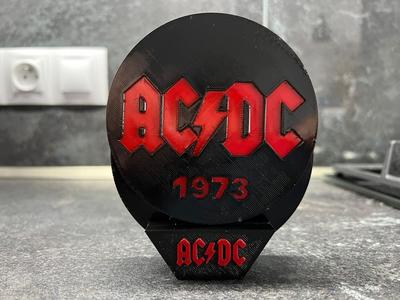 Tácek AC/DC