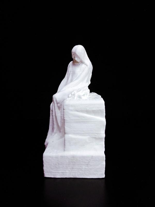 Gravestone Depicting a Young Woman