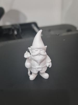 Garden dwarf gnome and his house