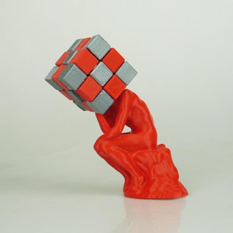 The Cuber (Thinker + Rubik's Cube)