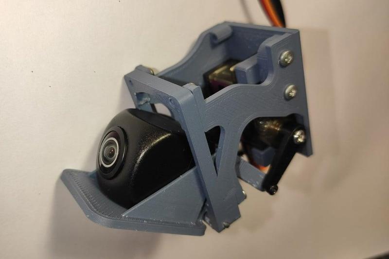 Motorized car rear view camera