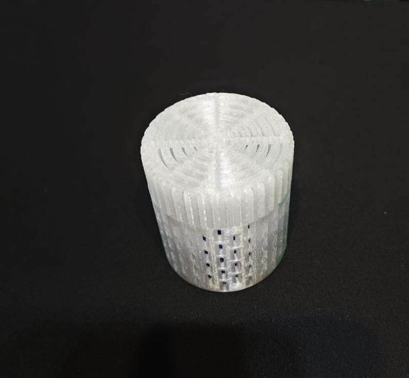 A silica gel box that fits into a filament spool