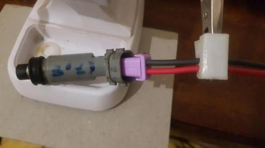 Injector connector plug.   