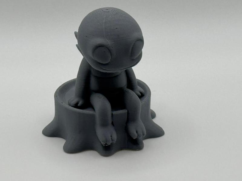 Chibi Alien sitting on a Tree