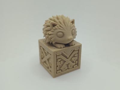 Hedgehog on an artfully decorated pedestal