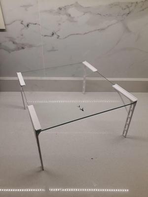 Brackets for freezer glass shelf