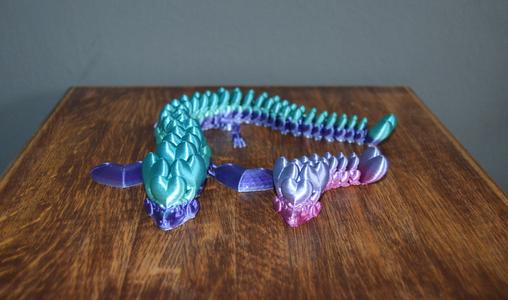 Two articulated heart dragons