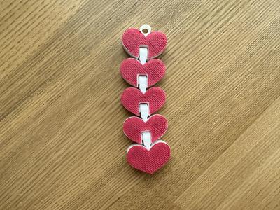 Articulated hearts keychain