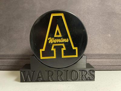 Hockey puck display stand