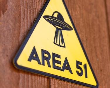 AREA 51 sign. Several different UFOs to choose from