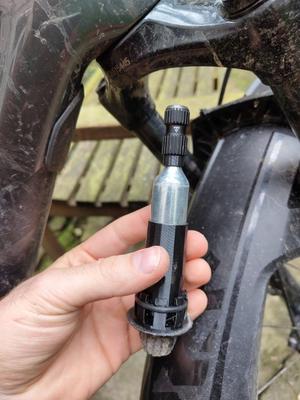 CO2 cartridge tool container for mtb fork