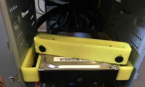 5.25" to 3.5" drive adapter with rubber grommet.