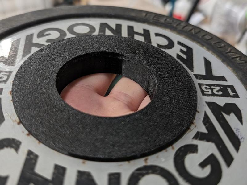 Technogym disk reduction hole