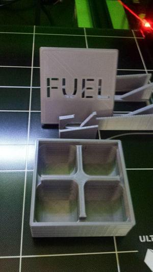 PowerGrid divided fuel compartment