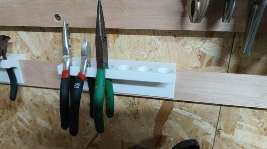 Plier hanger for french cleat