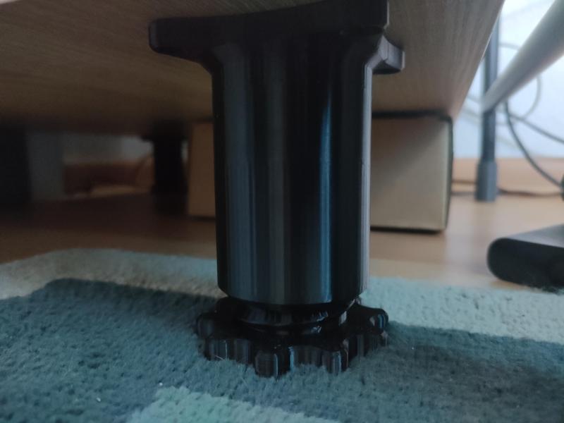 Adjustable foot with wrench