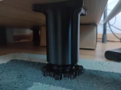 Adjustable foot with wrench
