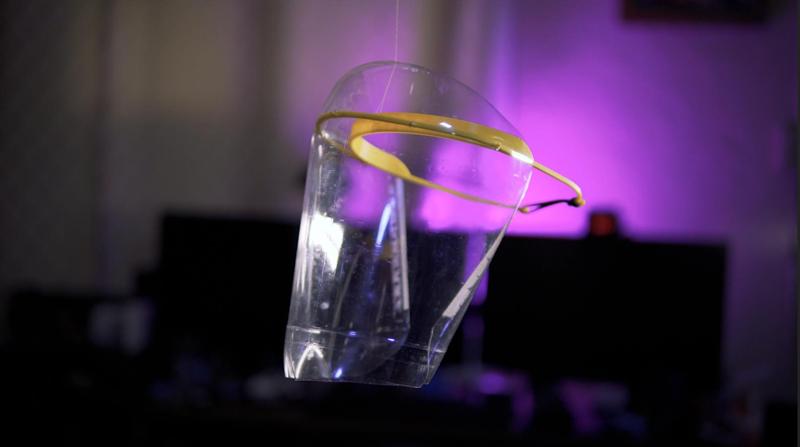 Face shield with two-liter bottle for screen and other easy to find materials