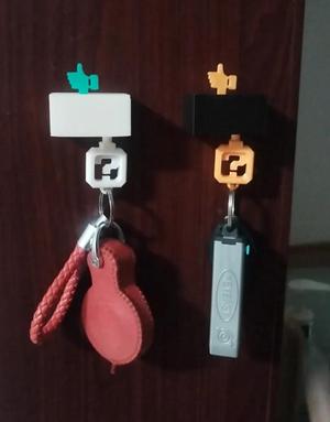 Thumb-Up Keychain Holder, Key Organizer, and Mechanism Toy