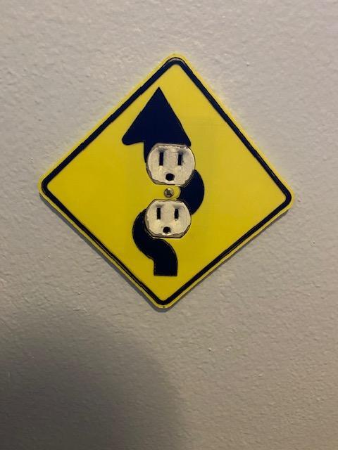 Road Sign Outlet Cover with Matching Outlet Plugs