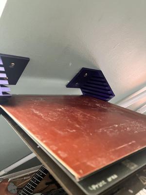 Wall mounted printbed holder