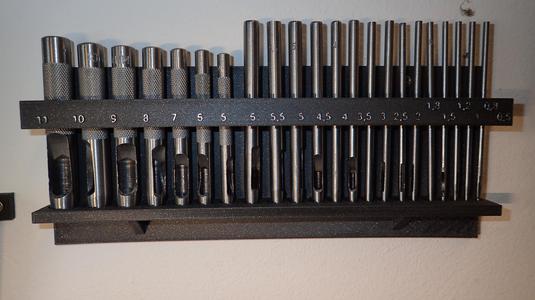 Hole punch wall mount