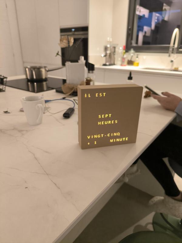 Word clock with invisible letters . French time