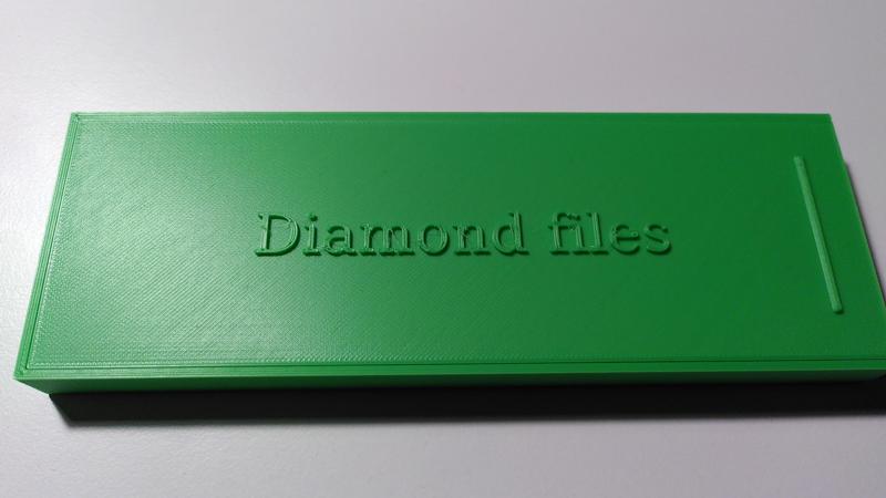 A box for a set of five diamond files