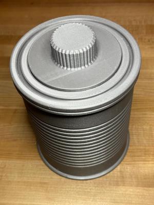 Big tin can with easy open lid.