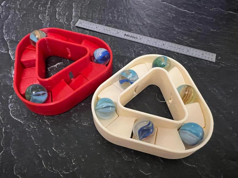 Triangle marble machine spinner