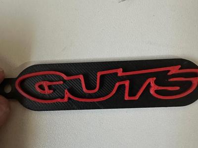 Guts racing keychain