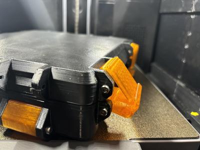 Compact double action latch for 4x4x6 boxes