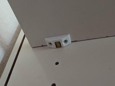 Shelf Board Dowel Retainer