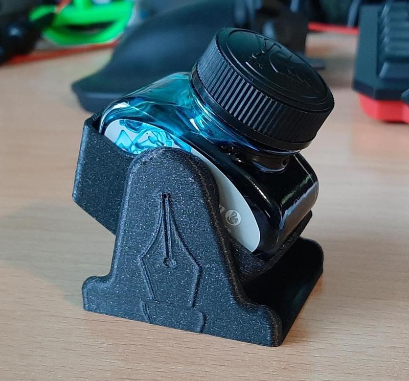 Fountain pen ink holder