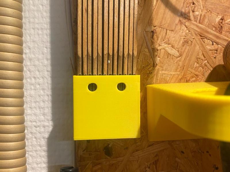 Folding ruler wall mount