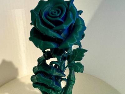 Skeletal hand rose holder