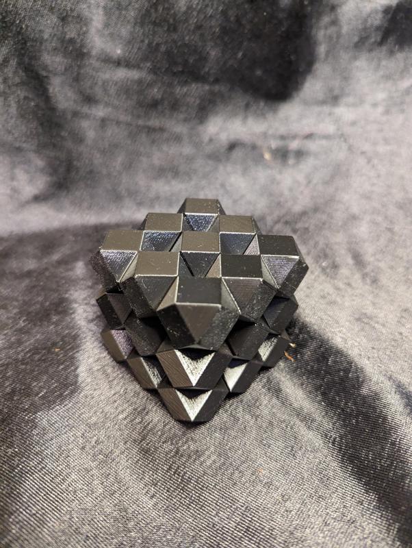 Cuboctahedron packing puzzle