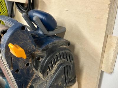 Wall mount for ryobi belt sander