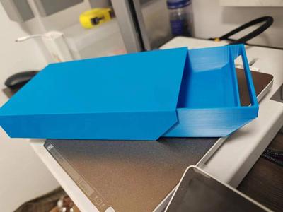A secret drawer under the table for hiding money